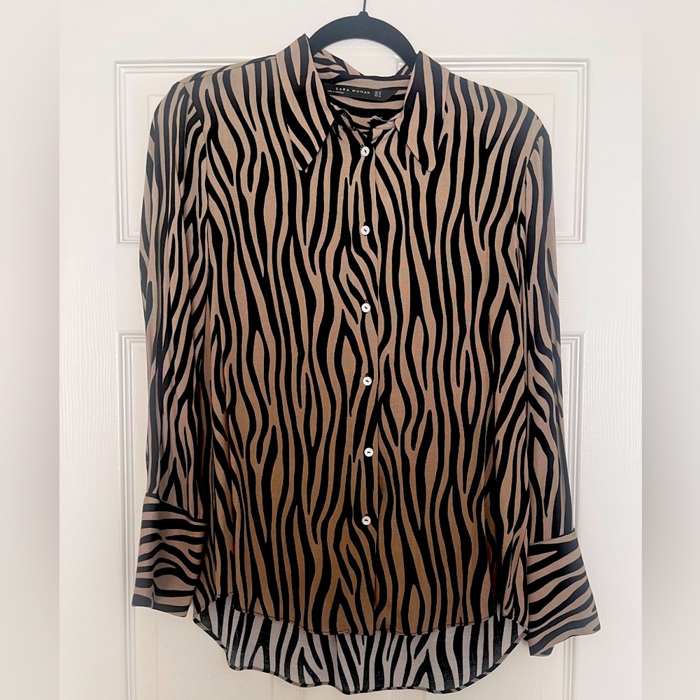 Animal print shirt.